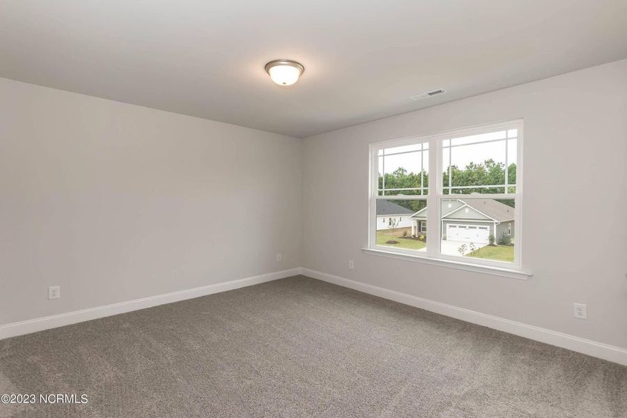 Representative unfurnished interior of a home built from the 3105 by Adams Homes in Parkland Place, Pace (Image 27).