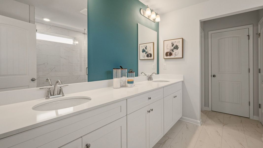 Primary bathroom with dual vanity Primary bathroom with dual vanity