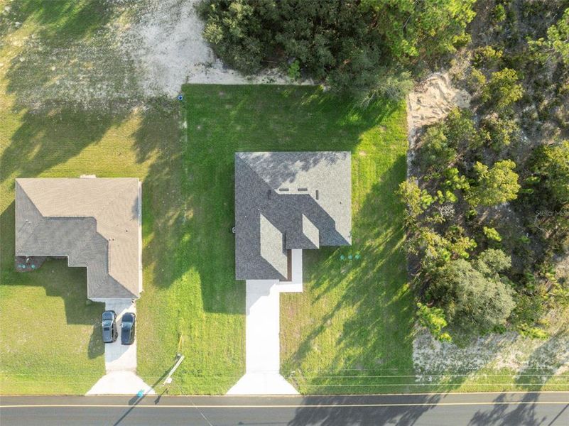Front exterior of a new home in , Ocala, FL, highlighting curb appeal (Image 16).
