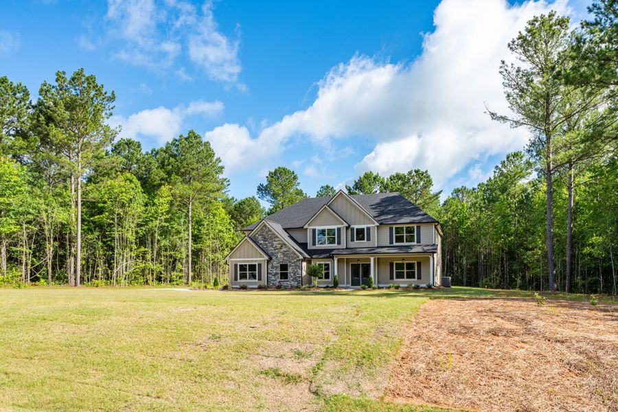 Front exterior of a new home in Flint Farms, Concord, GA, highlighting curb appeal (Image 29).