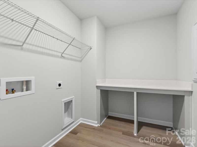 Laundry room with folding table