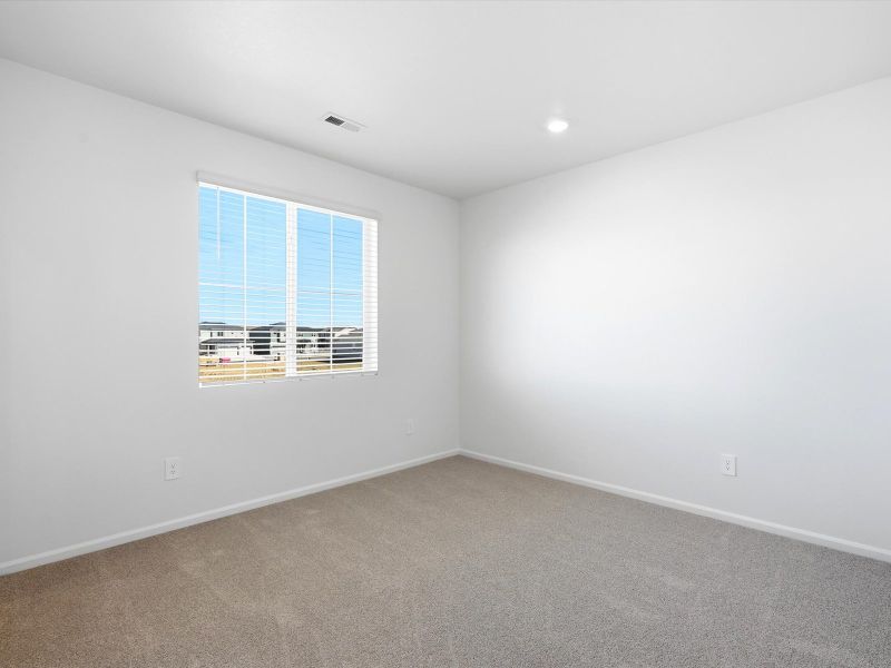 Spacious, unfurnished interior of a new home in Poudre Heights: The Alpine Collection, Windsor (Image 13).
