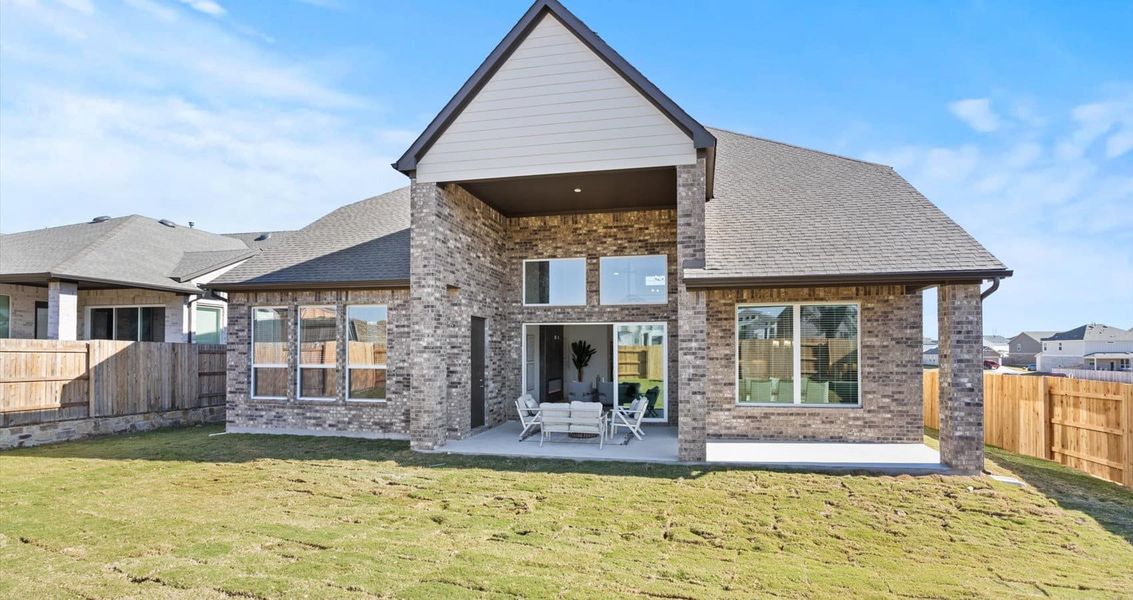 Representative exterior details of a home built from the Waterloo by Chesmar Homes in Sunfield, Buda (Image 3).