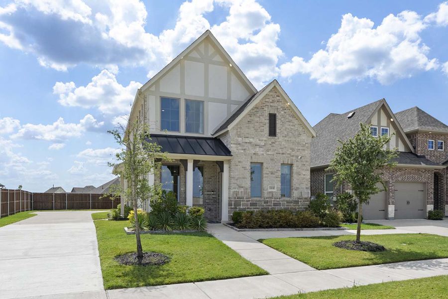 Front exterior of a new home in Elevon, Lavon, TX, highlighting curb appeal (Image 20). Front exterior of a new home in Elevon, Lavon, TX, highlighting curb appeal (Image 20).