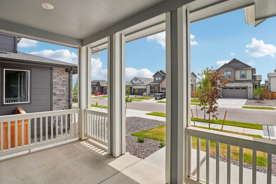 Exterior details and patio area of a home in The Cottages Collection at Ridgeline Vista, Brighton (Image 3).