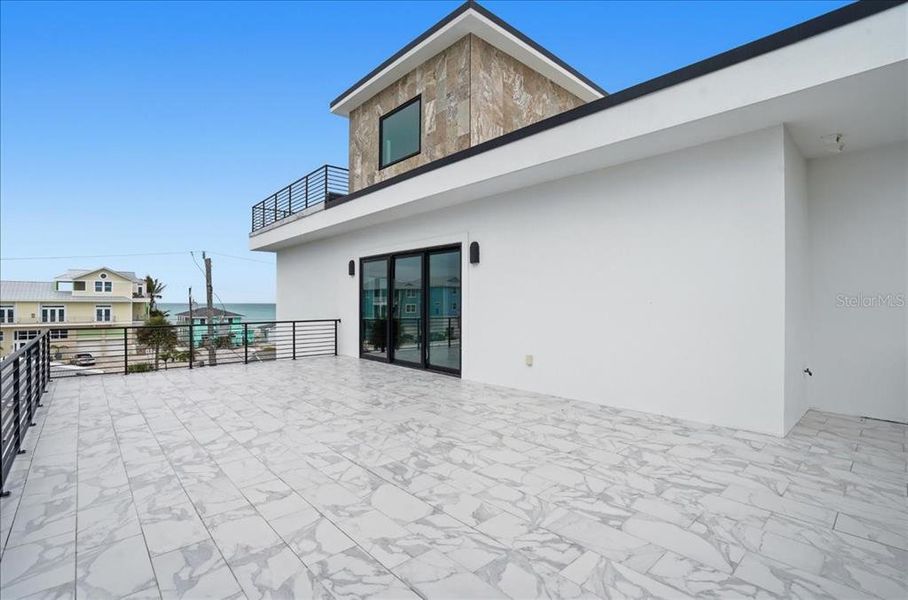 Exterior details and patio area of a home in , Englewood (Image 53).
