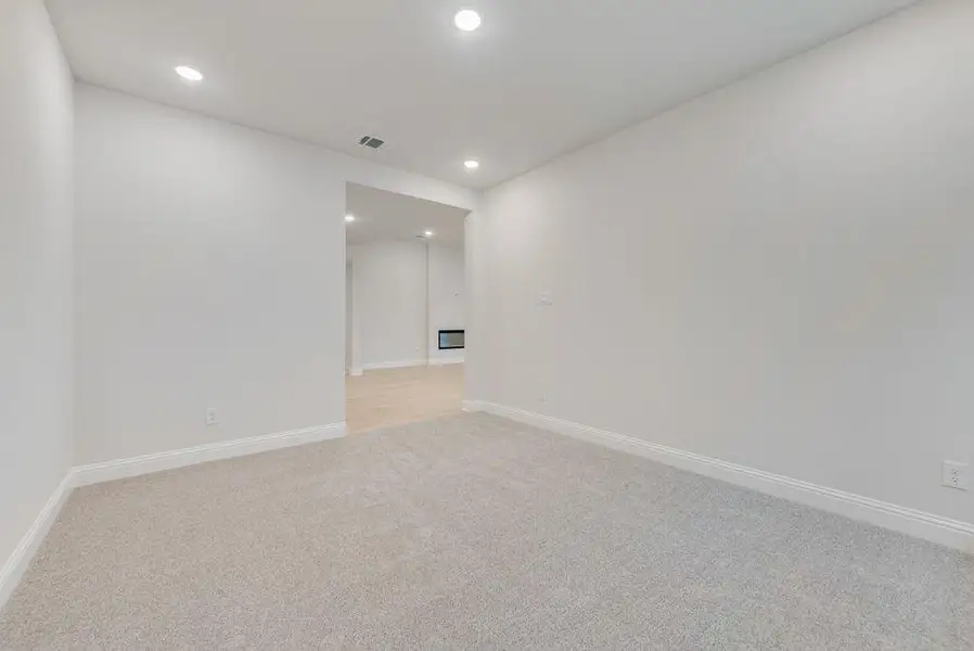 Spacious, unfurnished interior of a new home in Valencia On The Lake, Little Elm (Image 15).