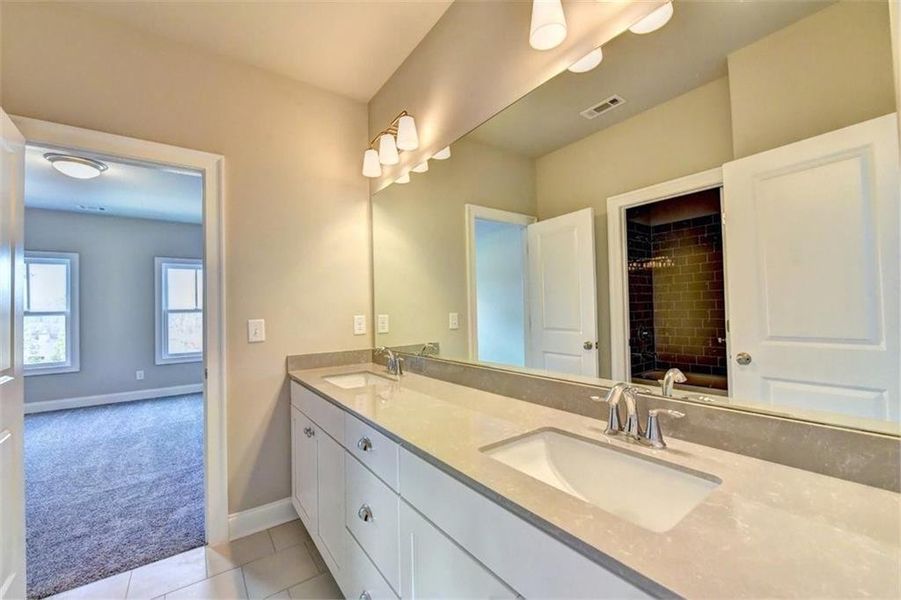 Furnished interior view inside a new home in Bellwyn, Johns Creek (Image 6).
