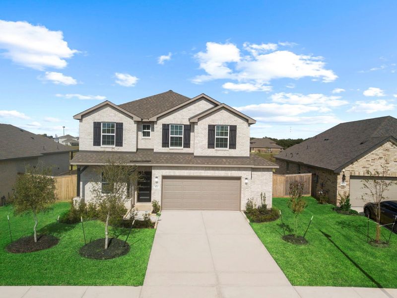 Gorgeous front elevation showcasing full brick on both levels, manicured landscaping, and an inviting entry that welcomes you home in style. Gorgeous front elevation showcasing full brick on both levels, manicured landscaping, and an inviting entry that welcomes you home in style.