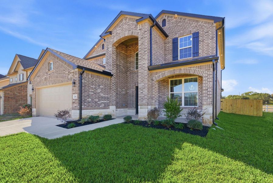 Front exterior of a new home in , Fresno, TX, highlighting curb appeal (Image 27).