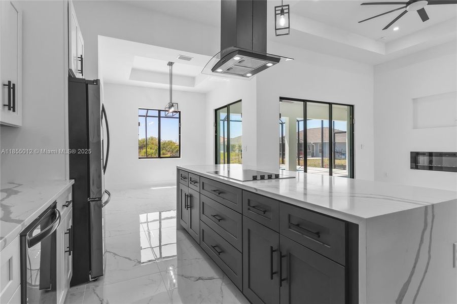 Note the designer change in the Island Cabinets to the Beautiful Dark Accent Color, Beautiful!