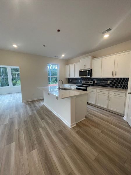 Furnished interior view inside a new home in Springwood Grove, Central (Image 7).