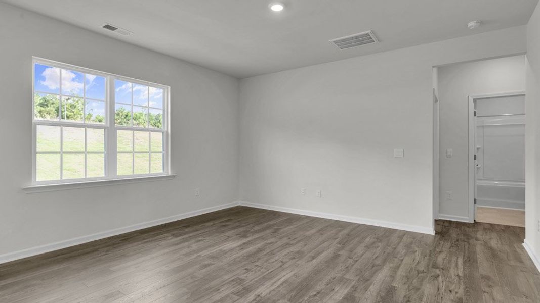 Spacious, unfurnished interior of a new home in The Preserve at Kinsley, Jamestown (Image 20). Spacious, unfurnished interior of a new home in The Preserve at Kinsley, Jamestown (Image 20).