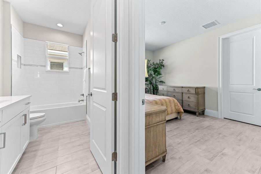 Furnished interior view inside a new home in Belterra, Port St. Lucie (Image 37).