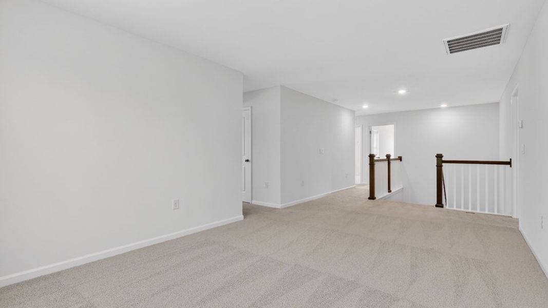 Representative unfurnished interior of a home built from the Wylie by D.R. Horton in The Grove at Winston Pointe, Clayton (Image 11). Representative unfurnished interior of a home built from the Wylie by D.R. Horton in The Grove at Winston Pointe, Clayton (Image 11).
