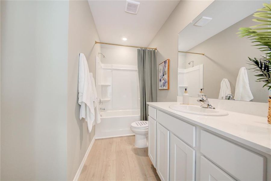 Furnished interior view inside a new home in The Gardens at Bay Street, Sarasota (Image 11).