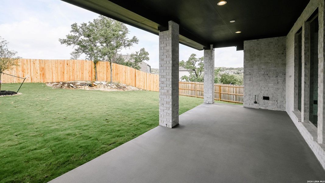 Exterior details and patio area of a home in Johnson Ranch, Bulverde (Image 4).