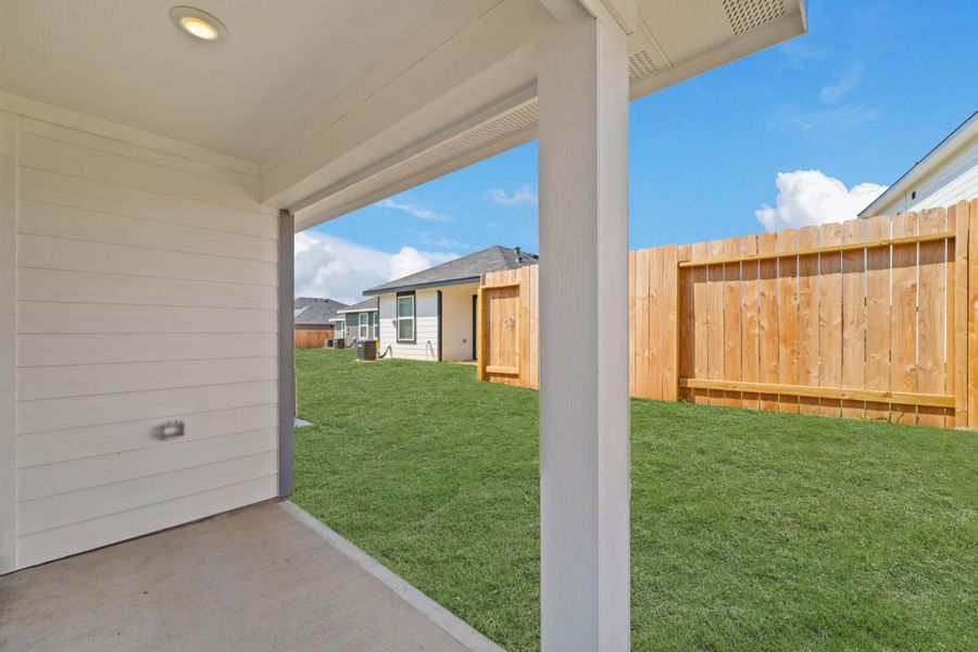Exterior details and patio area of a home in Castles Edge, Willis (Image 3).