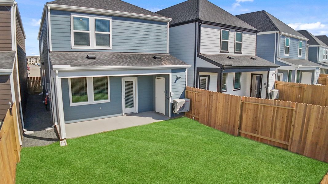 Exterior details and patio area of a home in Villarosa at Tamarron, Katy (Image 32).