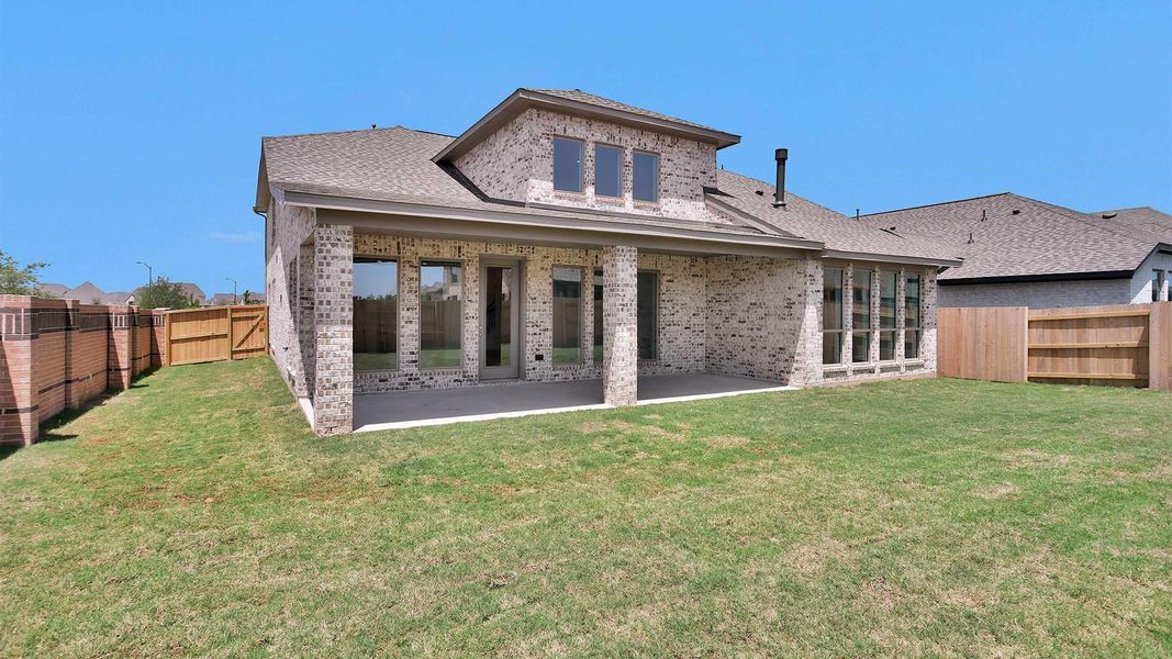 Exterior details and patio area of a home in Elyson, Katy (Image 2).
