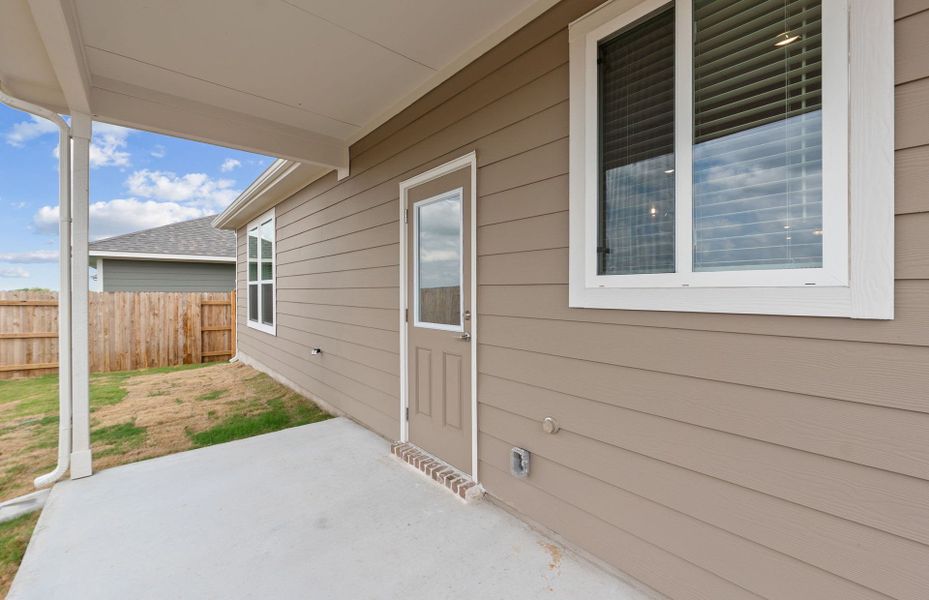 Exterior details and patio area of a home in Patterson Ranch, Georgetown (Image 21).
