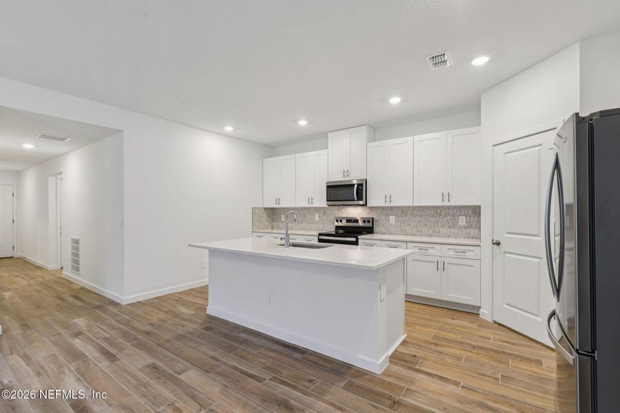 Furnished interior view inside a new home in Colbert Landings, Palm Coast (Image 9).