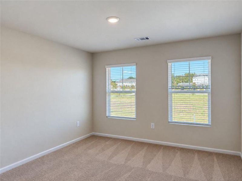 Spacious, unfurnished interior of a new home in Lake Carlton, Loganville (Image 13).