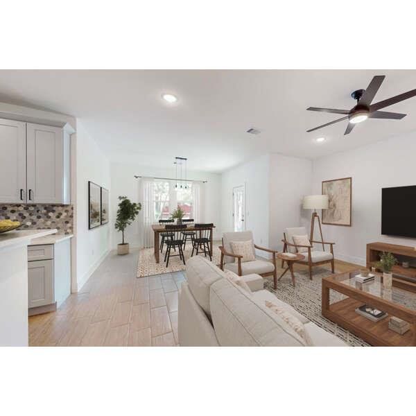 Living area featuring ceiling fan and recessed lighting