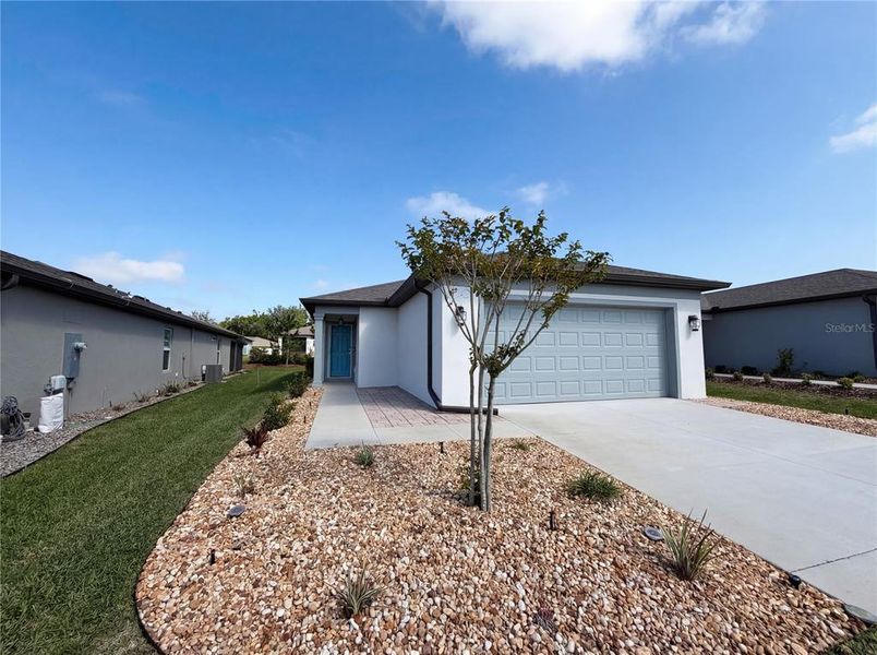Front exterior of a new home in , Ocala, FL, highlighting curb appeal (Image 1). Front exterior of a new home in , Ocala, FL, highlighting curb appeal (Image 1).