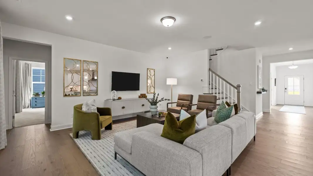 Inviting family room in the two-story single family Townsend plan by DRB Homes in York, SC. Inviting family room in the two-story single family Townsend plan by DRB Homes in York, SC.