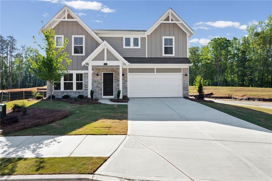 Front exterior of a new home in Sage Woods, Dallas, GA, highlighting curb appeal (Image 20).