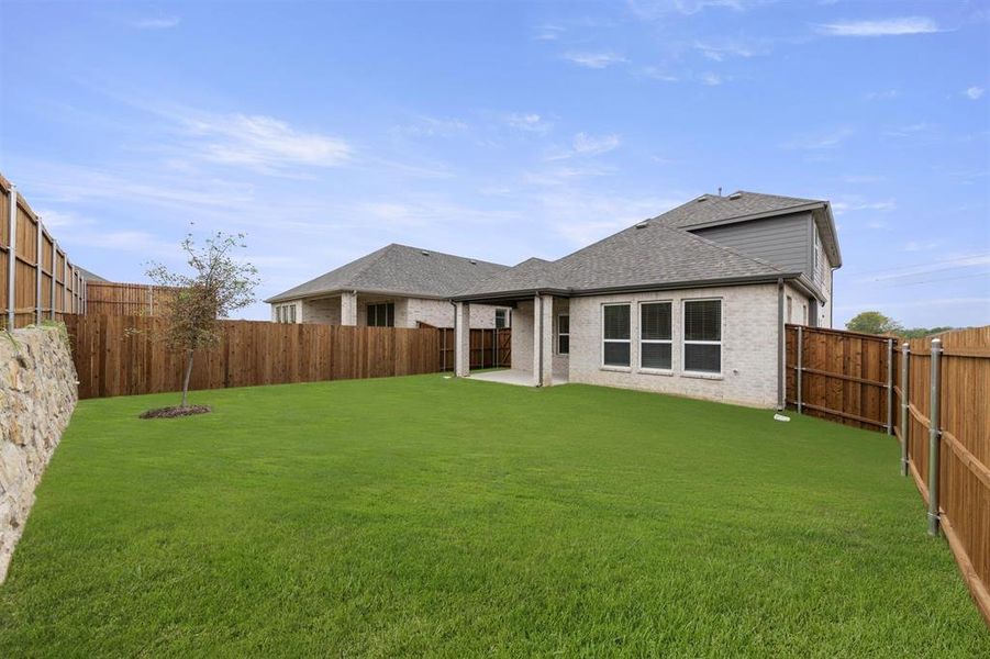 Exterior details of a home in The Villages of Hurricane Creek, Anna (Image 2).
