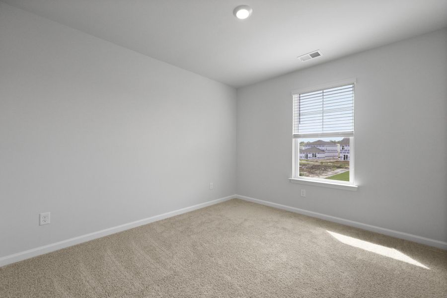 Spacious, unfurnished interior of a new home in Pine Hills at Cane Bay, Summerville (Image 15).
