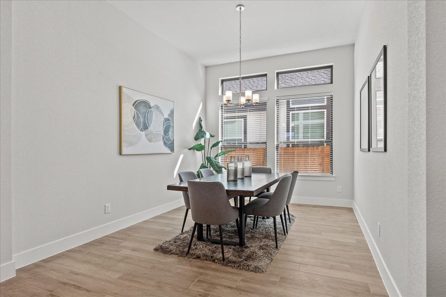 Representative furnished interior of a home built from the Bradley by Chesmar Homes in Sweetwater, Austin (Image 6).