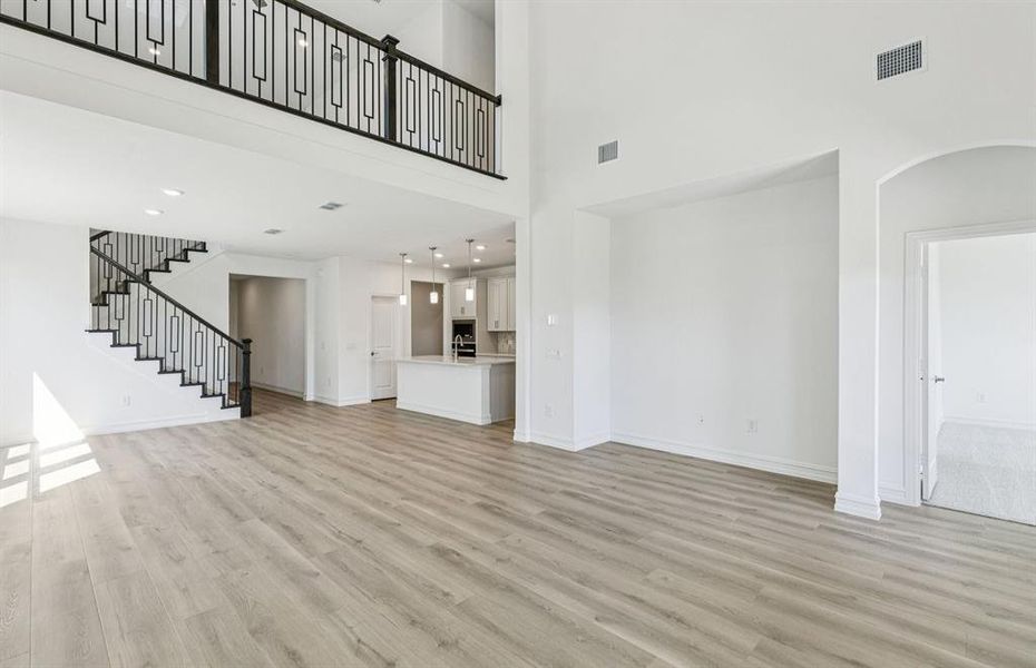 Open concept gathering room creating a spacious and inviting atmosphere Open concept gathering room creating a spacious and inviting atmosphere