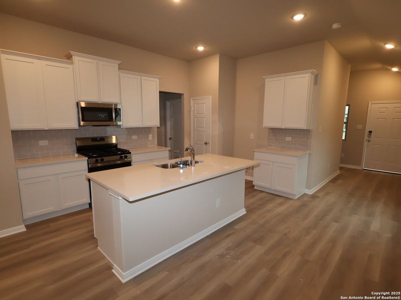 Furnished interior view inside a new home in Winding Brook, San Antonio (Image 9).