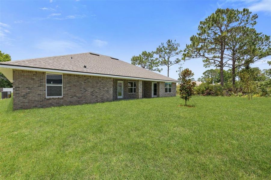 Exterior details and patio area of a home in , Palm Coast (Image 32).