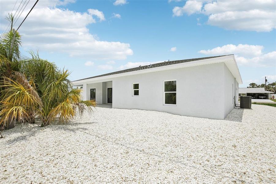 Front exterior of a new home in , Sun City Center, FL, highlighting curb appeal (Image 23).