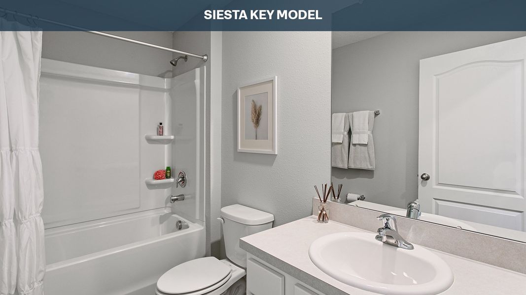 Representative furnished interior of a home built from the Siesta Key by D.R. Horton in Sawmill Branch Express, Palm Coast (Image 17).