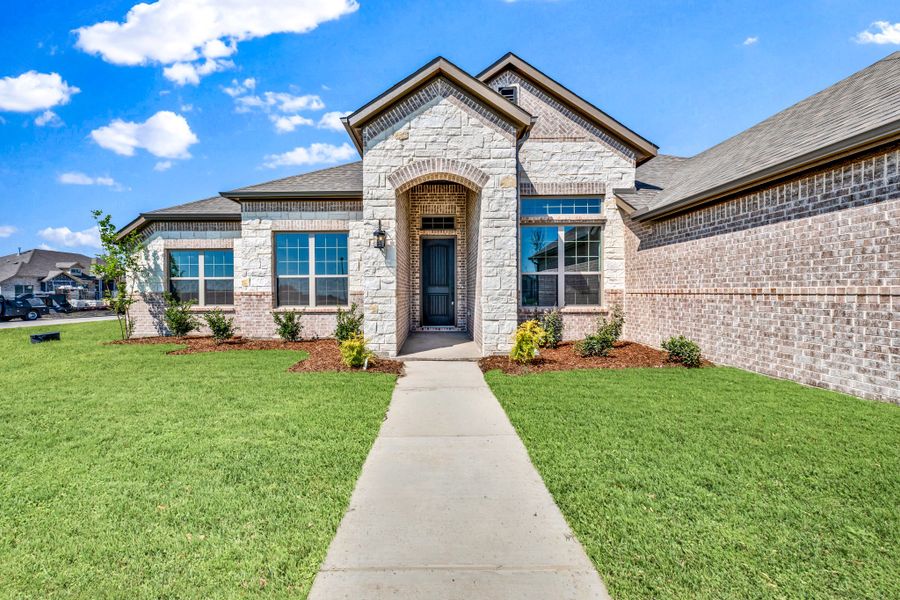 Front exterior of a new home in Berkshire Estates, Mesquite, TX, highlighting curb appeal (Image 21).