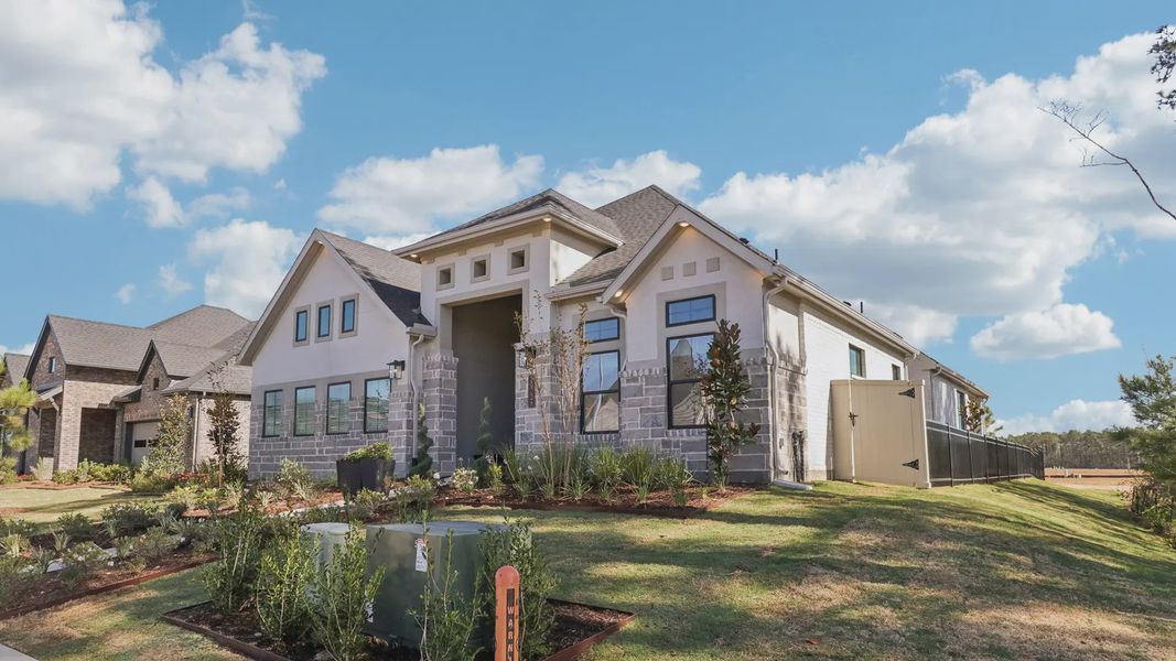 Representative exterior photo of a completed home built from the Marbella by Chesmar Homes in Audubon, Magnolia, TX (Image 21).
