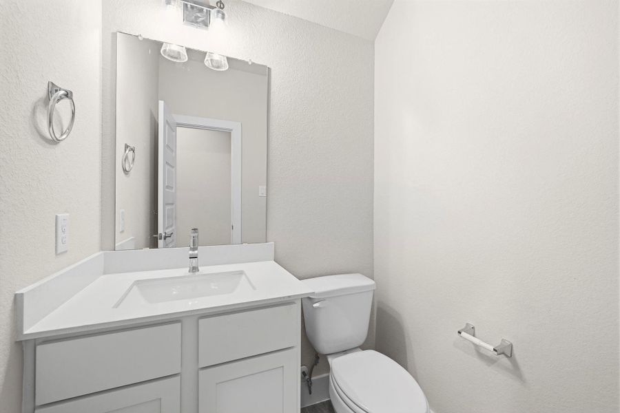 Furnished interior view inside a new home in Barton Creek Ranch, Conroe (Image 8).