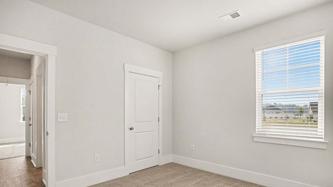 Representative unfurnished interior of a home built from the Acadia by D.R. Horton in Chapman Village, Conway (Image 16). Representative unfurnished interior of a home built from the Acadia by D.R. Horton in Chapman Village, Conway (Image 16).