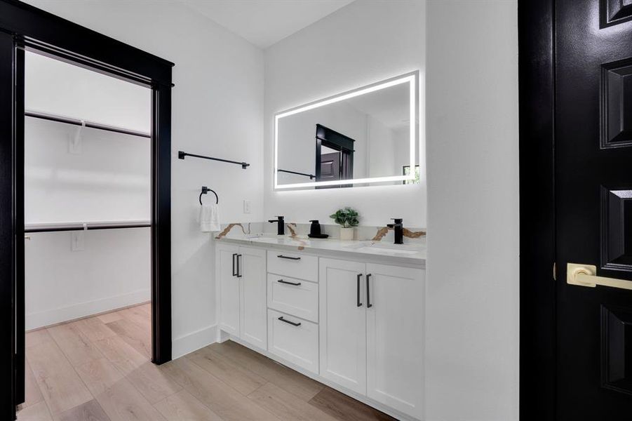 Large walk-in closet in owner's retreat.