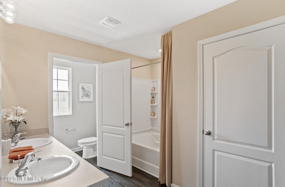 Furnished interior view inside a new home in Sawmill Branch, Palm Coast (Image 5).