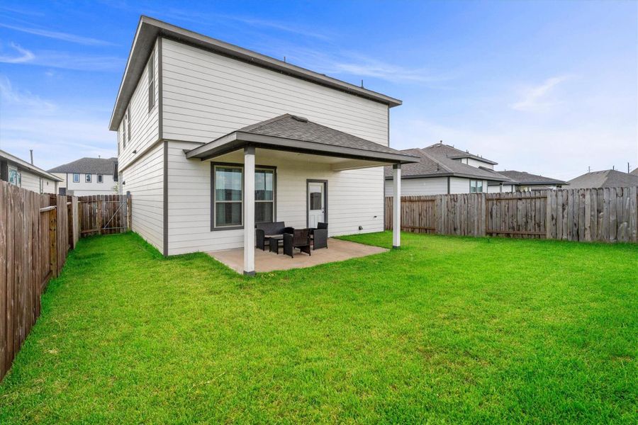 Exterior details and patio area of a home in Bluestem, Brookshire (Image 24). Exterior details and patio area of a home in Bluestem, Brookshire (Image 24).
