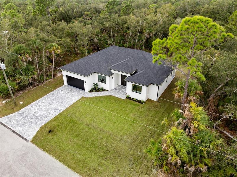 Front exterior of a new home in , Port Charlotte, FL, highlighting curb appeal (Image 33).