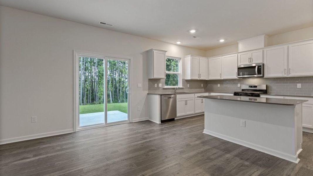 Representative furnished interior of a home built from the hanover by D.R. Horton in Bexford, Willow Spring (Image 5).