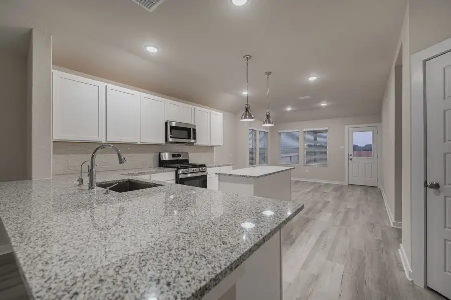 Representative furnished interior of a home built from the Gunther by Chesmar Homes in Briarwood, Cypress (Image 3).