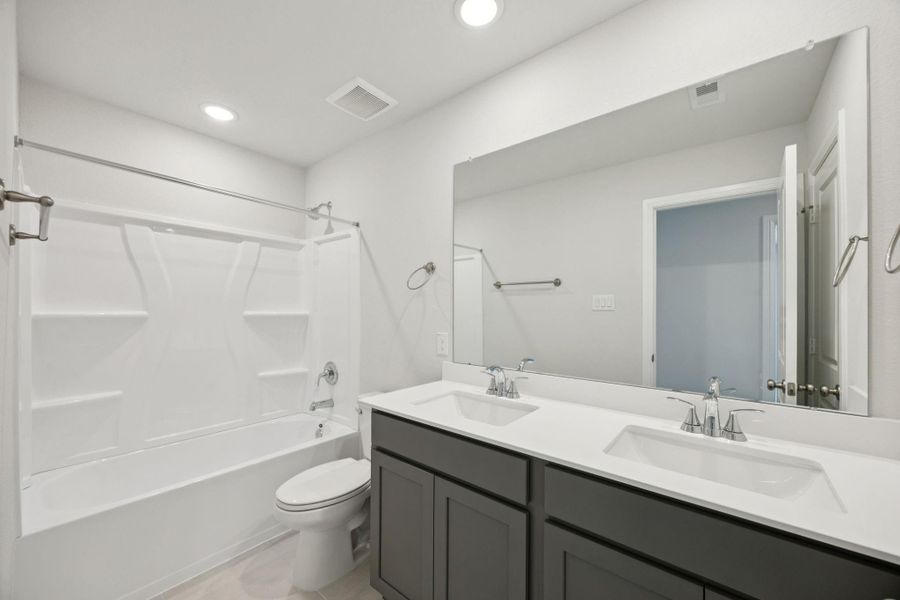 Furnished interior view inside a new home in Saint Tropez, Huffman (Image 6).